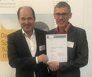 Already for the third time in a row ASPION was awarded with the seal of quality "Software made in Germany" by Bundesverband IT Mittelstand e.V. In the picture fLTR: Martin Hubschneider, Vice President BiTMi with ASPION founder and CEO Michael Wöhr